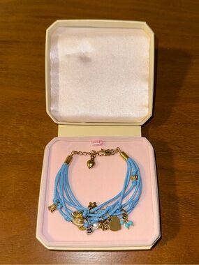 Juicy Couture Blue Multi-Strand Charm Bracelet with Gold Accents